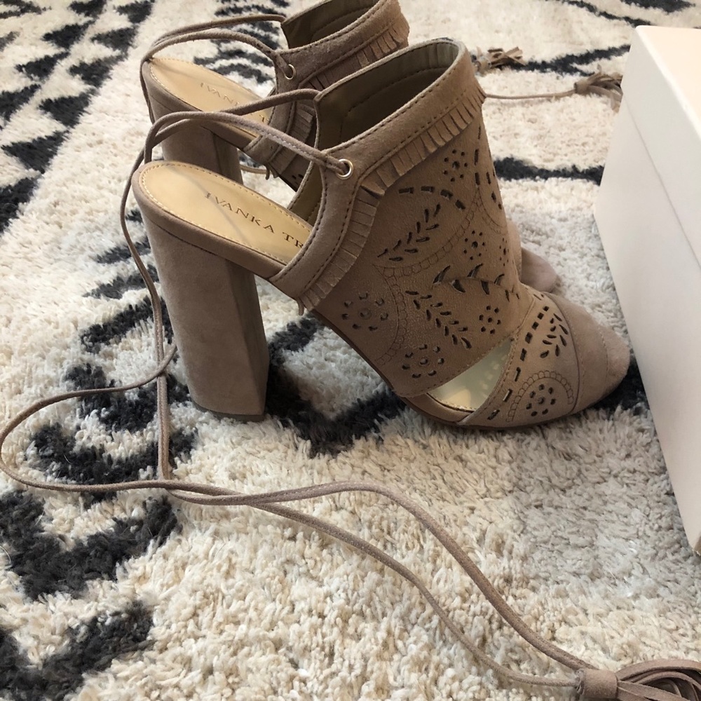 Tan suede open toe heel.